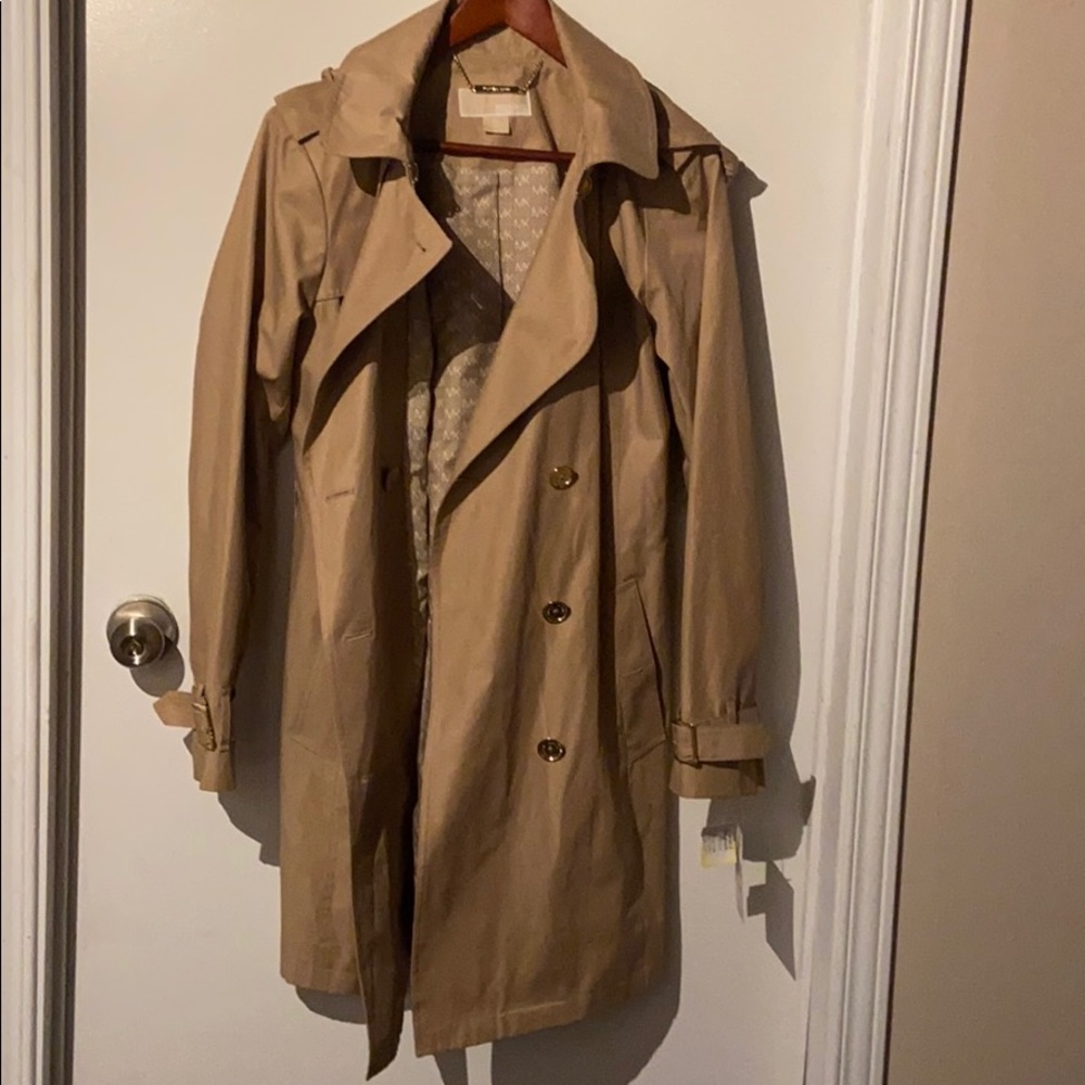 Michael Kor’s tan Trench Coat